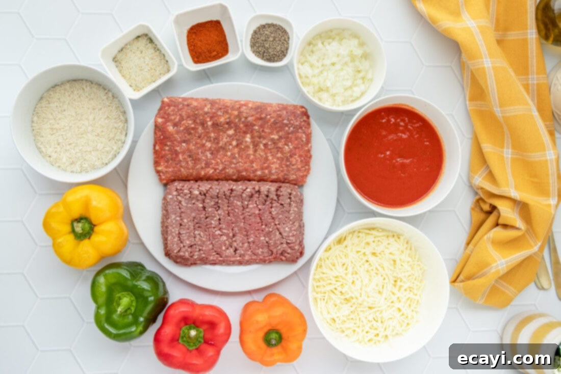 Hearty Stuffed Bell Pepper Bake 4 Ingredients laid out on a counter for making Stuffed Peppers, including bell peppers, ground meat, rice, cheese, and tomato sauce.