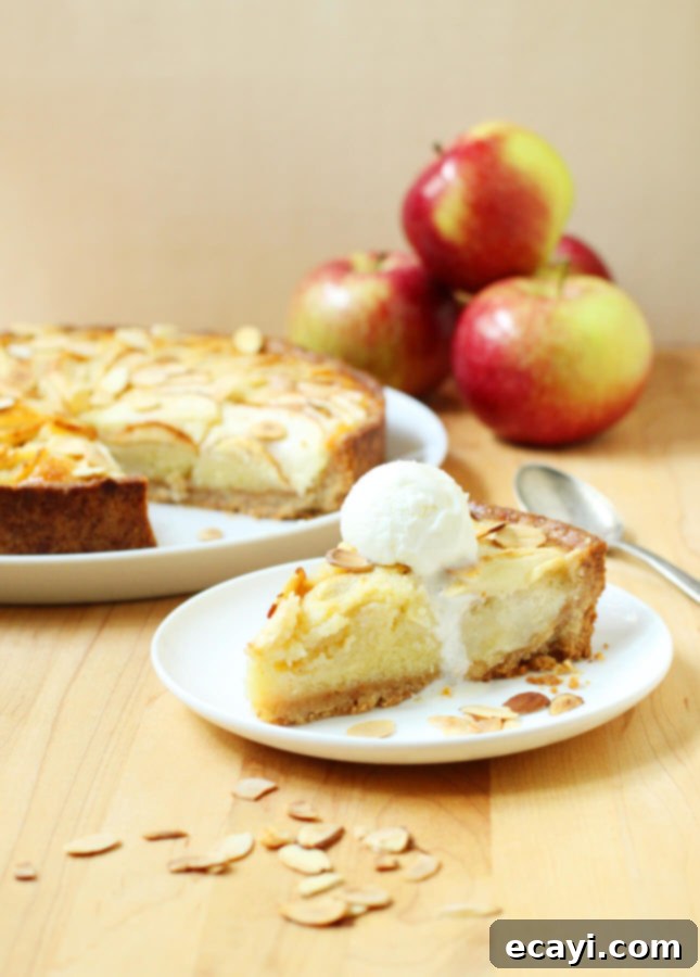 Classic Apple Frangipane Tart 4 Slice of Apple Frangipane Tart with butterscotch sauce