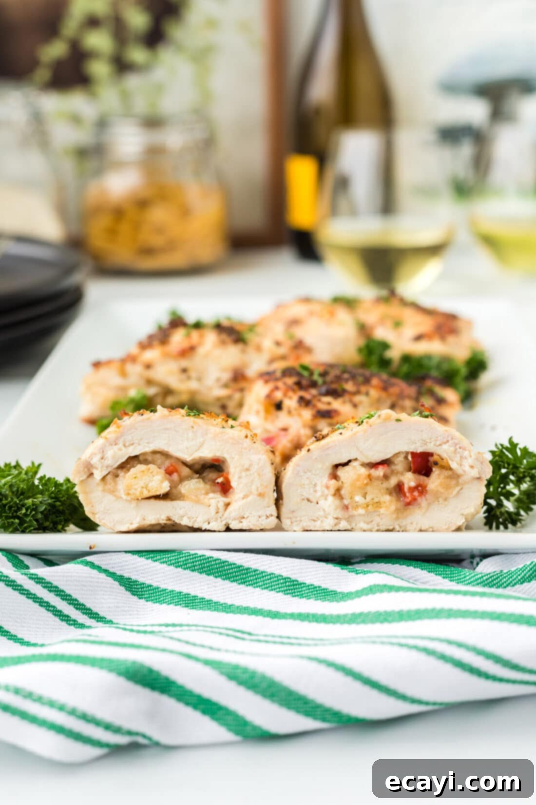 Savory Stuffed Chicken Breasts 2 Juicy Stuffed Chicken Breast sliced open on a serving platter, revealing savory filling