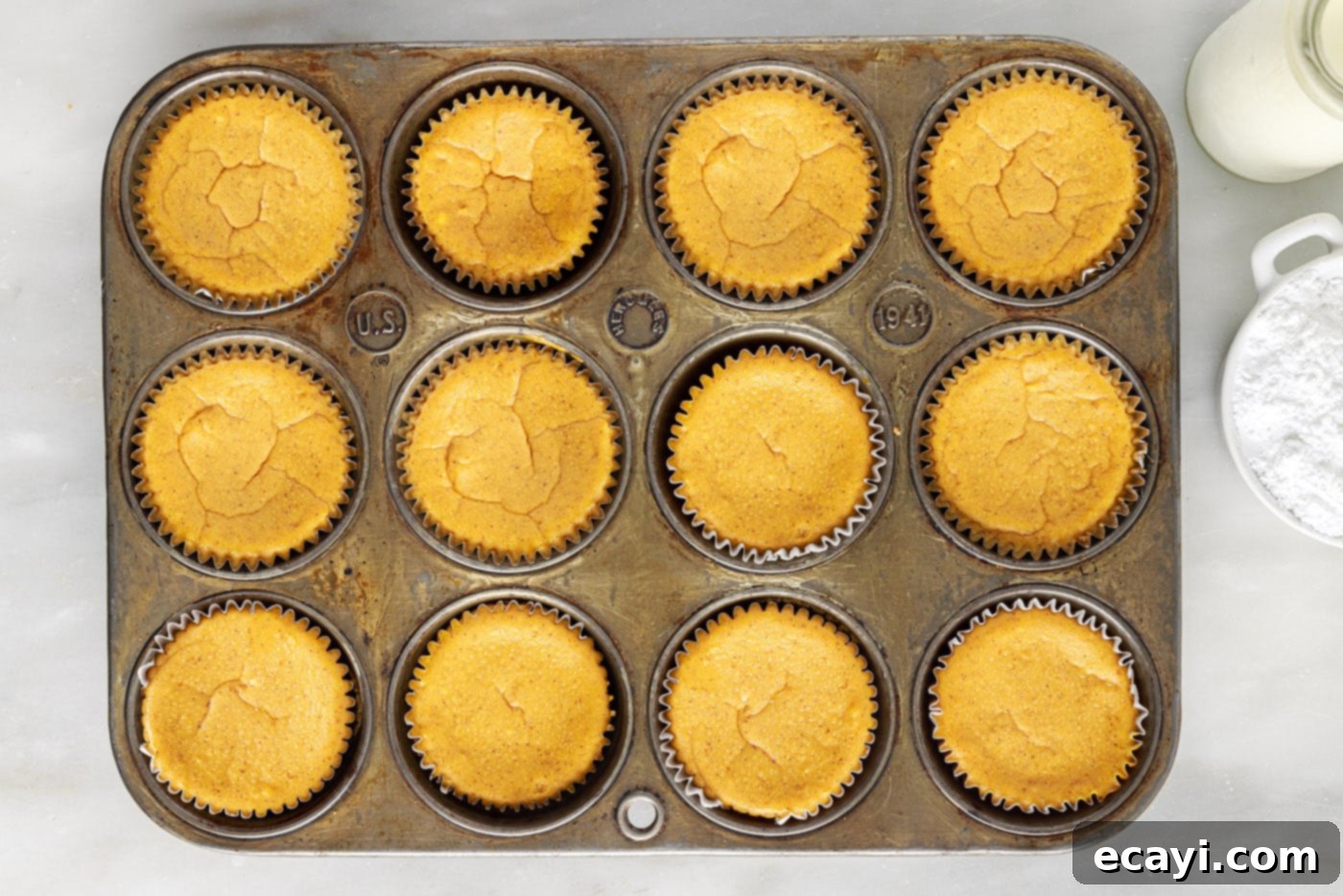 Spiced Mini Pumpkin Cheesecakes 12 mini pumpkin cheesecakes in a muffin tin