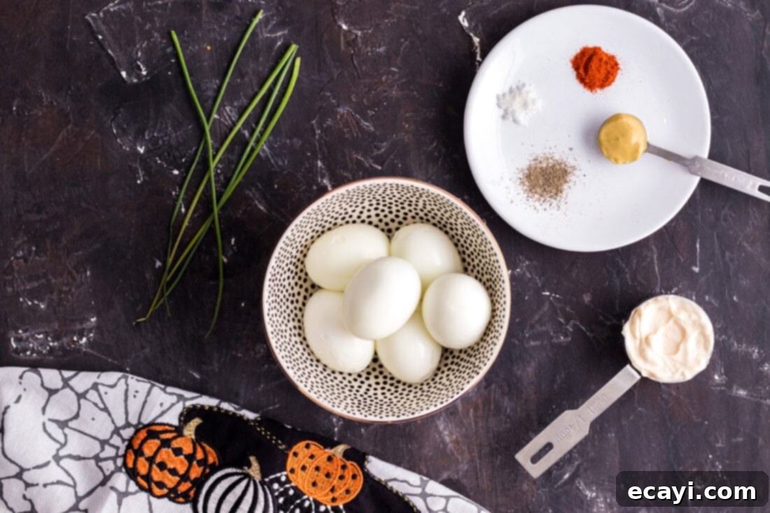Creamy Pumpkin Deviled Delights 4 All the necessary ingredients laid out for making Pumpkin Deviled Eggs