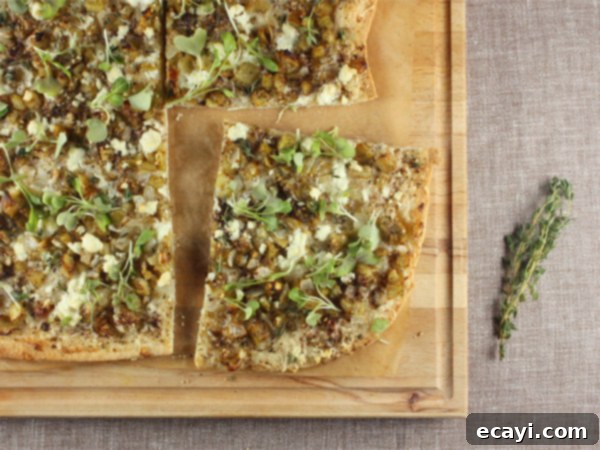 Roasted Eggplant, Feta & Chickpea Pizza 2 Za'atar, Feta, and Roasted Eggplant Pizza - A vibrant Mediterranean delight.