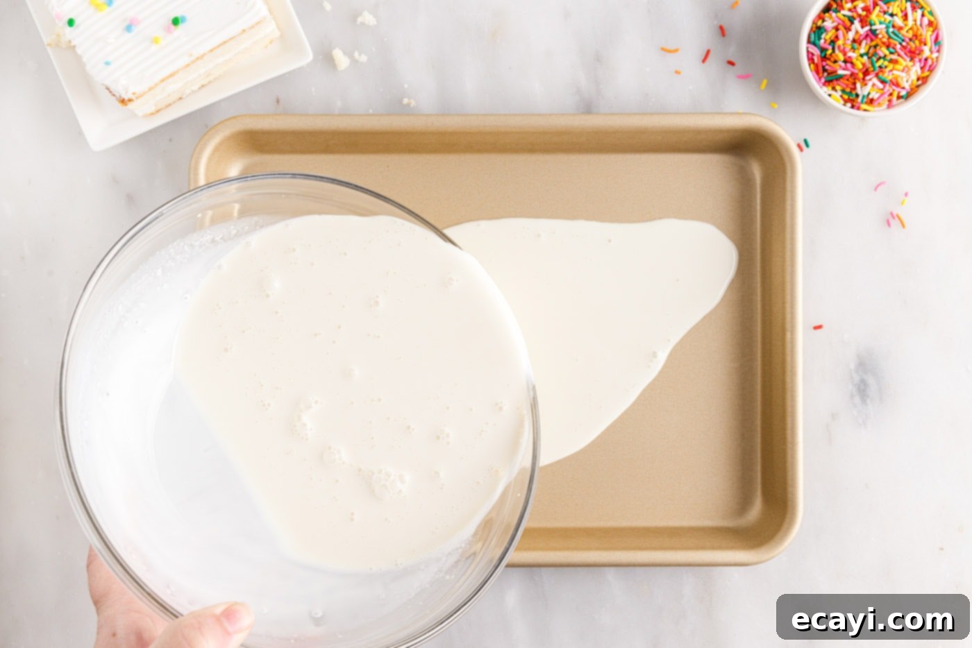 Confetti Cake Swirls 6 Pouring the vanilla ice cream base mixture evenly into a chilled sheet pan.