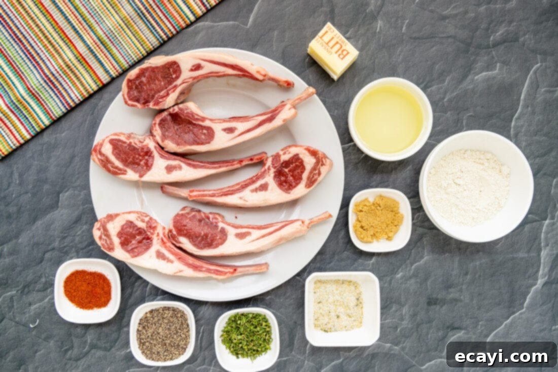 Gourmet Lamb Lollipops 4 A flat lay of all ingredients for lollipop lamb chops, including lamb, spices, flour, olive oil, butter, and thyme.