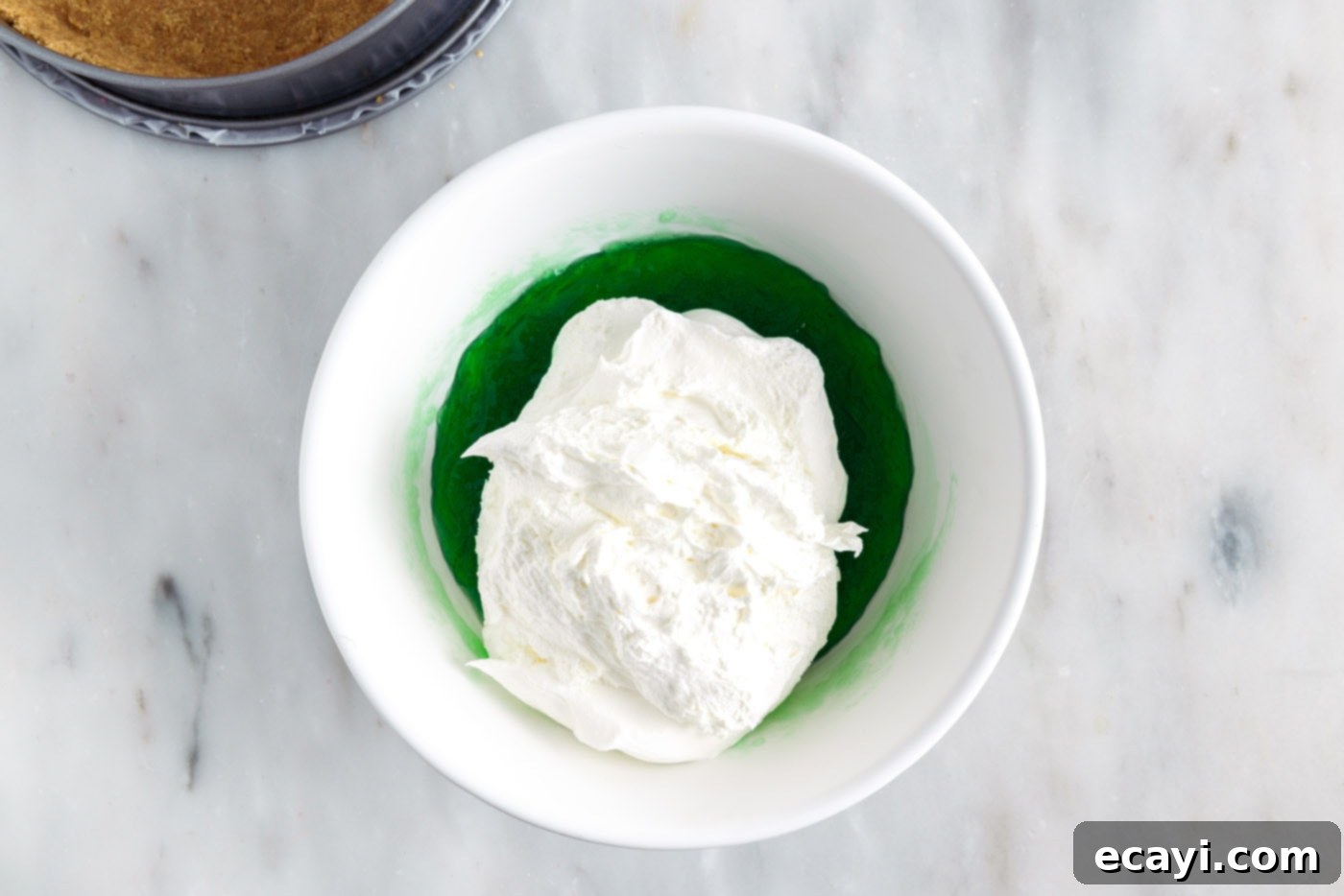 Jell-O Stacked Delight 8 cool whip on top of lime jello