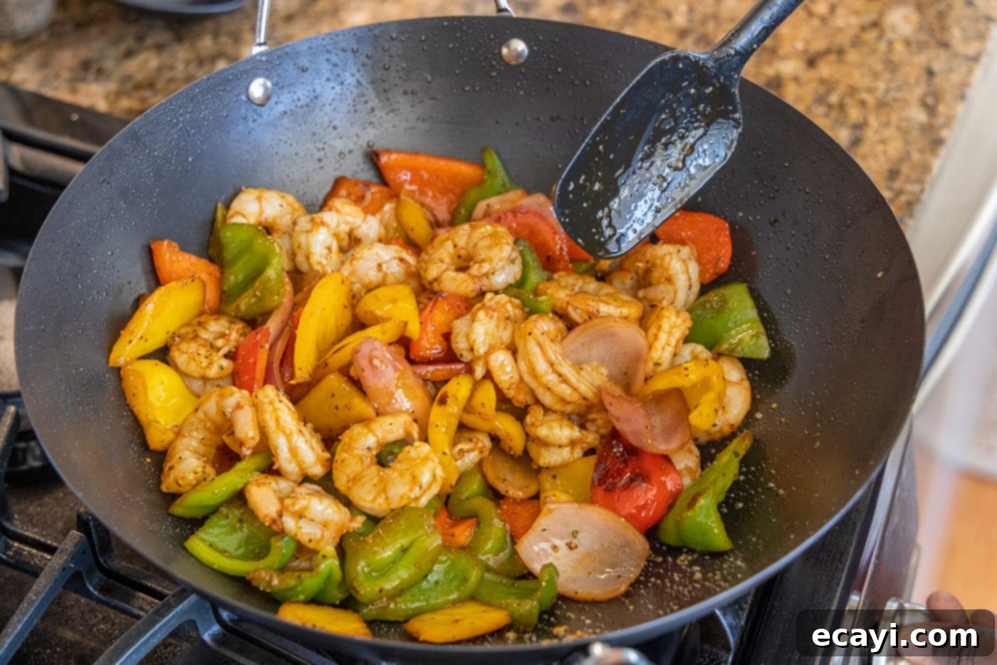 Zesty Peppercorn Shrimp 13 Cooked shrimp and tender-crisp vegetables mixed together in a large skillet or wok.