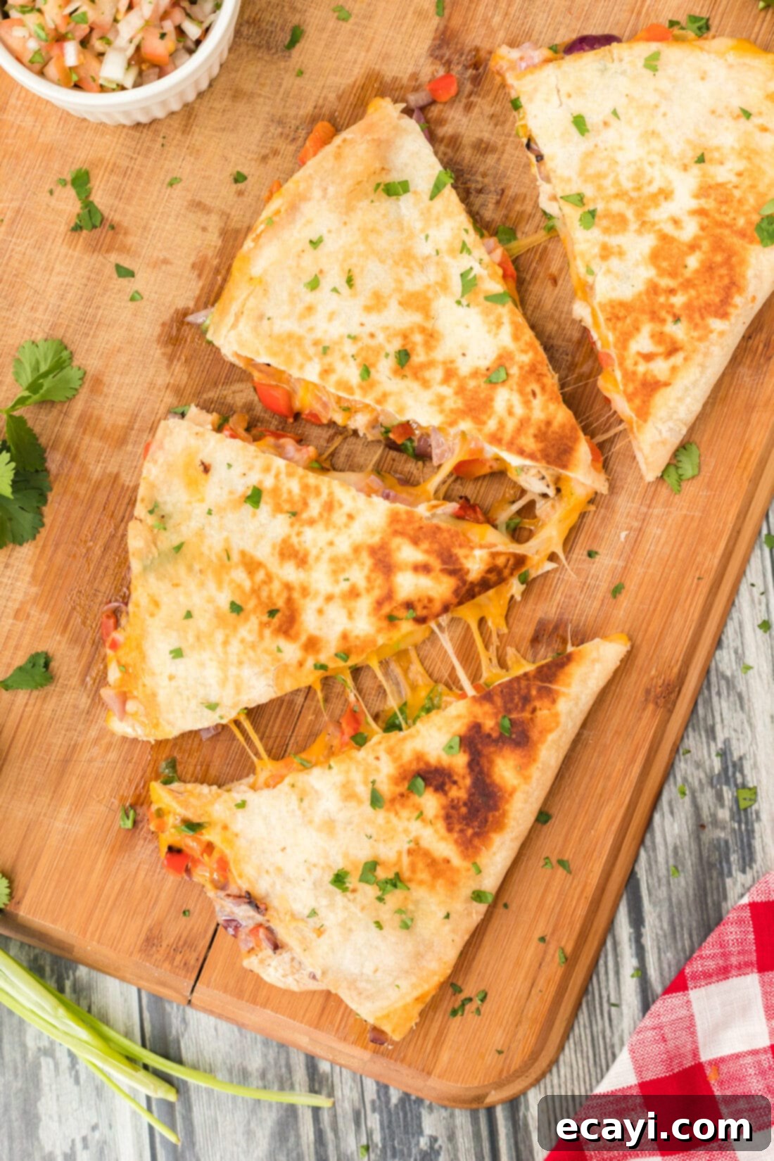 Savory Chicken Quesadilla 2 Chicken Quesadillas on a cutting board