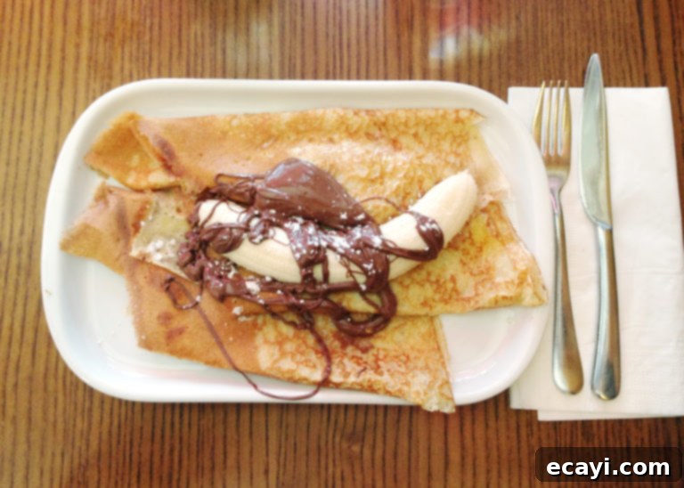 Paris Through Tiny Eyes: Exploring the City with Your Baby 10 A Nutella and banana crêpe in Paris