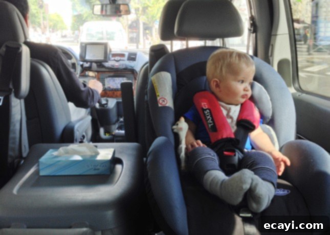 Paris Through Tiny Eyes: Exploring the City with Your Baby 7 Inside one of Taxi G7's Family Cabs, a convenient and safe choice with a baby