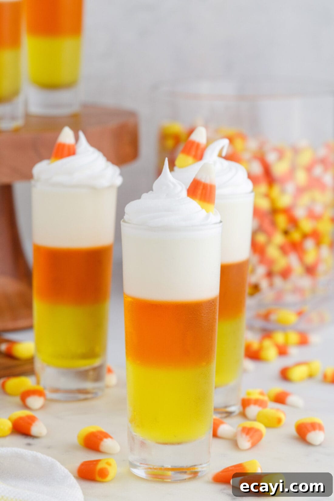Harvest Hues Shooters 3 Candy Corn Jello Shots with candy corn in background