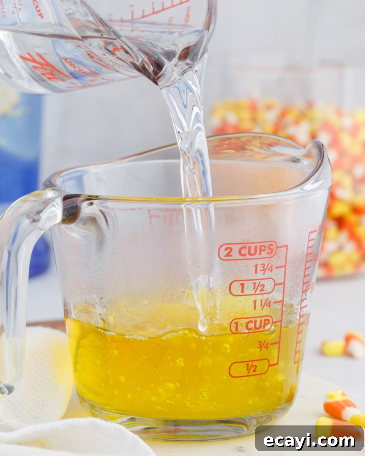 Harvest Hues Shooters 5 pouring water into lemon jello mix