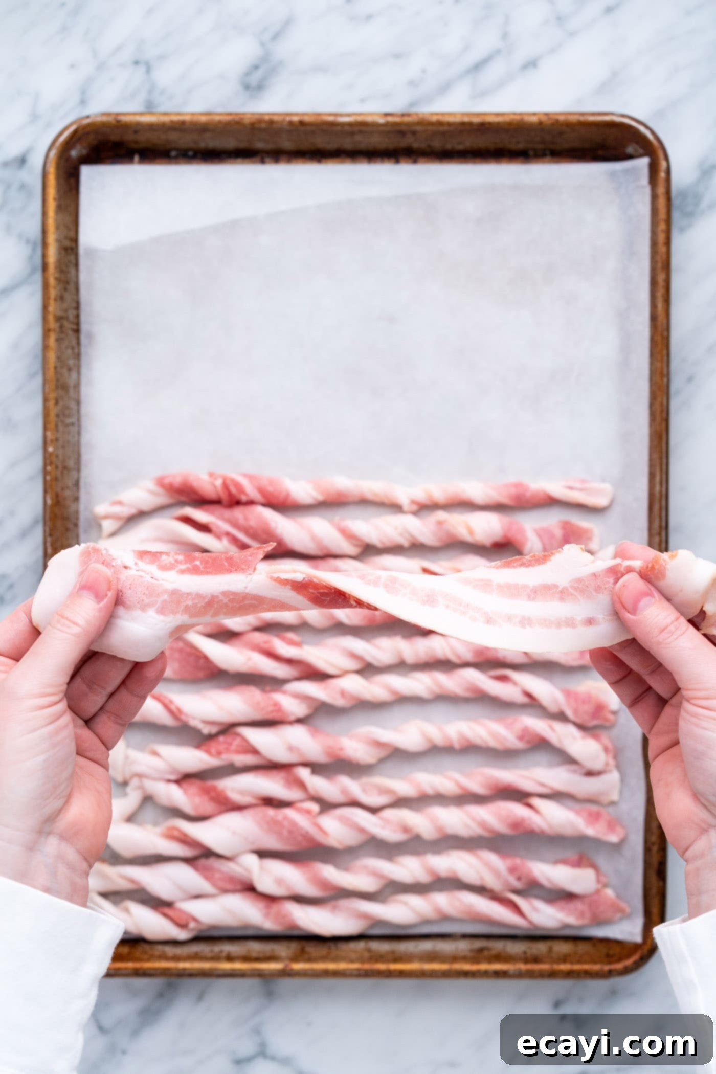 Crispy Bacon Spirals 5 Twisting thick cut bacon carefully for oven baking
