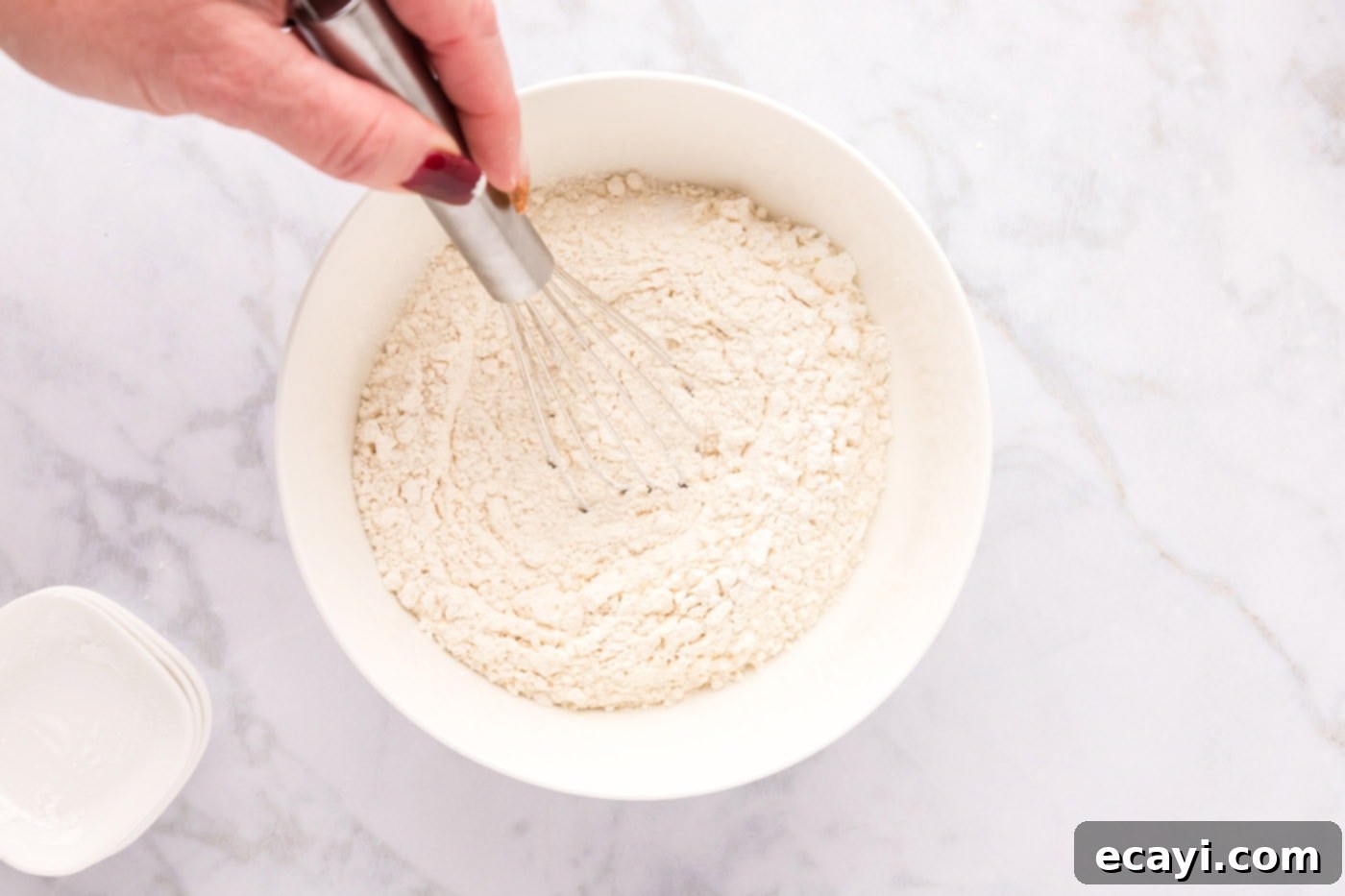 Sweet & Salty Fluffernutter Delights 5 whisking flour, salt, baking soda, and cornstarch in a bowl for Fluffernutter Cookies