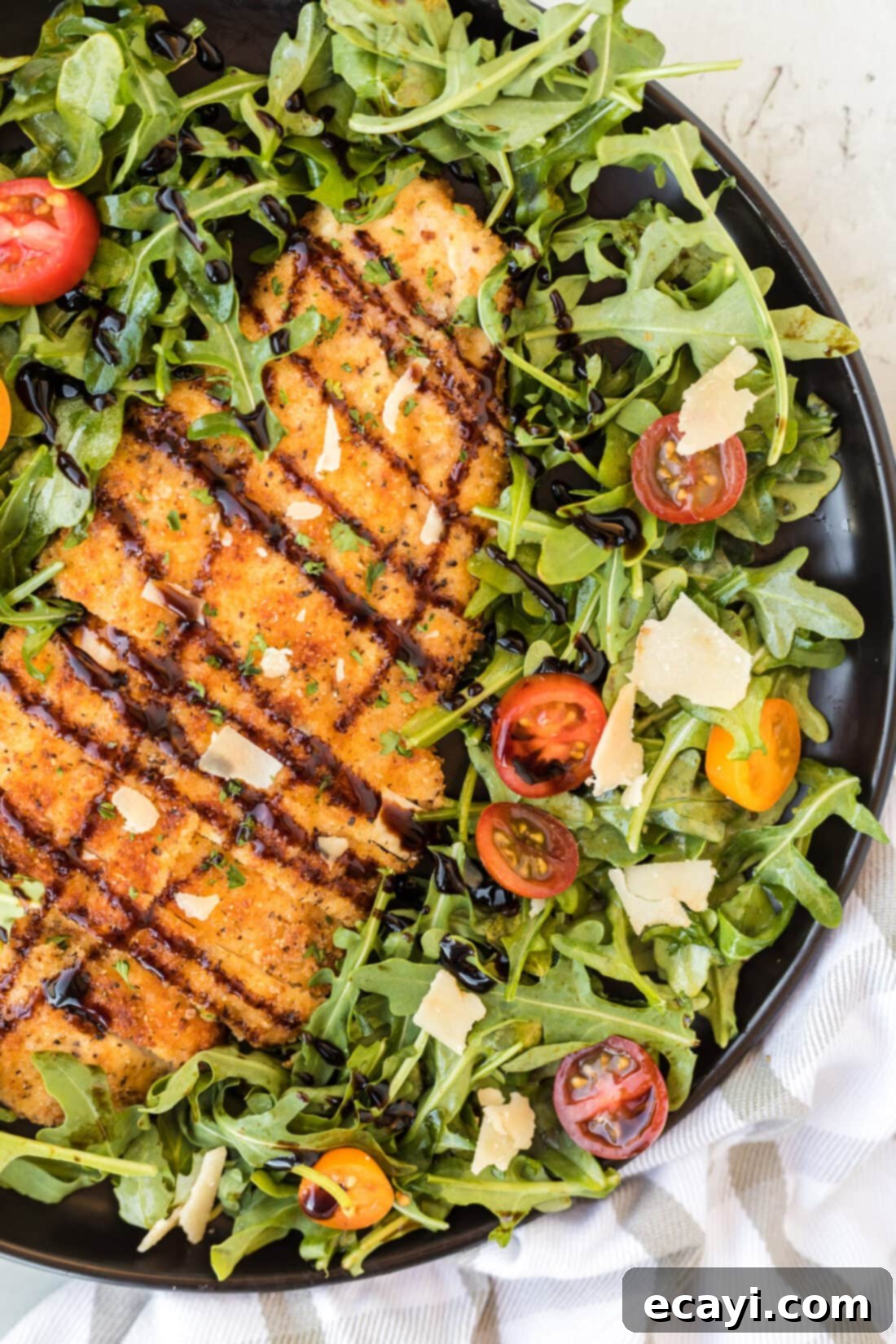 Crispy Chicken Milanese 15 Chicken Milanese served with a fresh green salad and lemon wedges