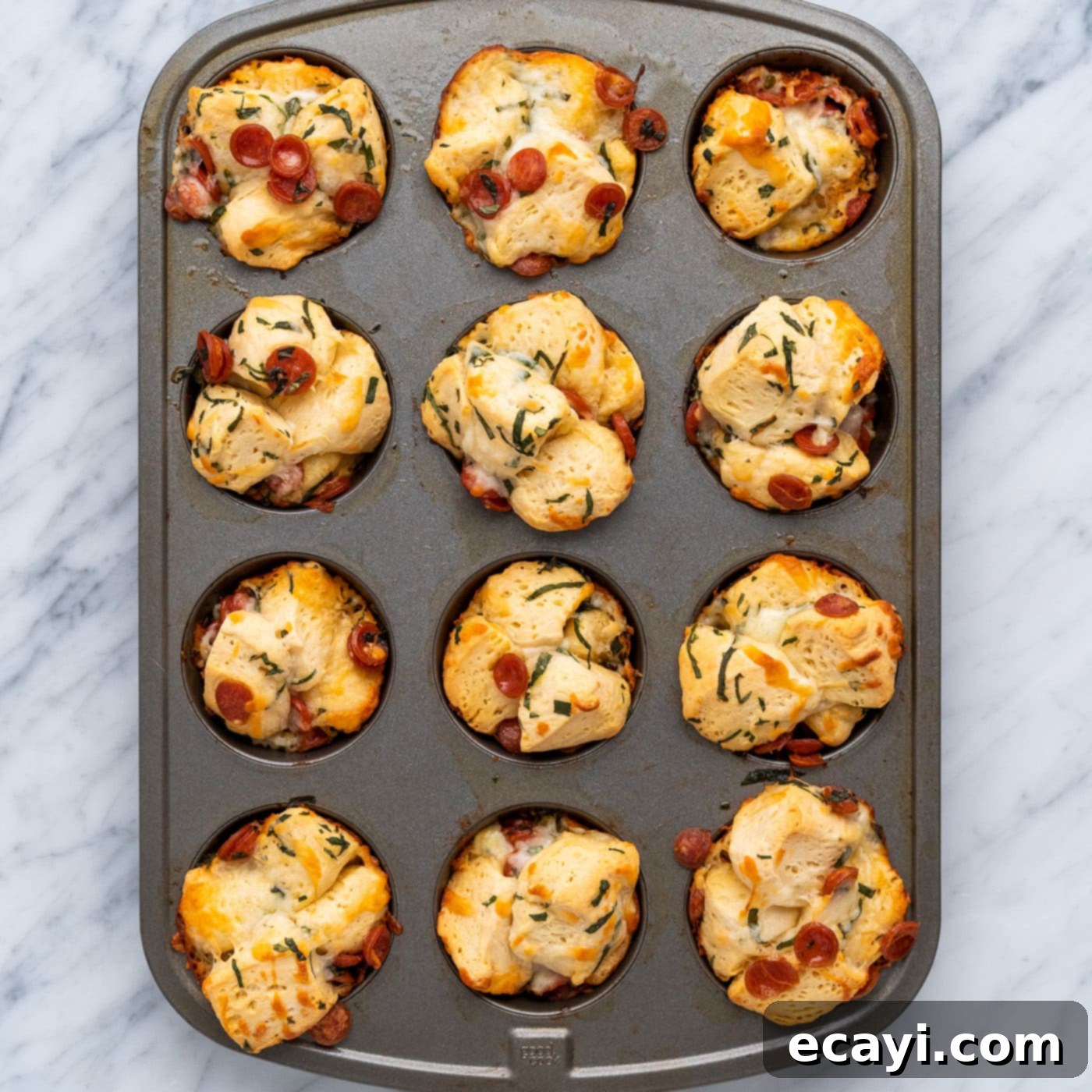 Pizza Bites 11 baked pizza bites in a muffin pan