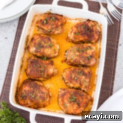 Golden Baked Chicken Thighs 9 Baked Chicken Thighs in a pan