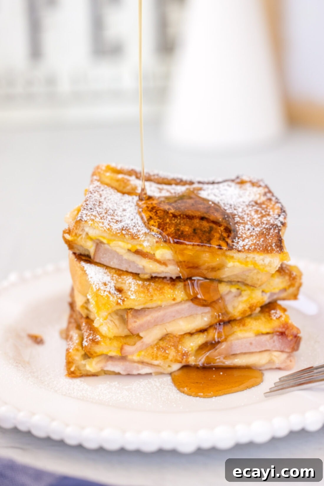 Sweet and Savory Monte Cristo Indulgence 2 stack of Monte Cristo Sandwich with syrup