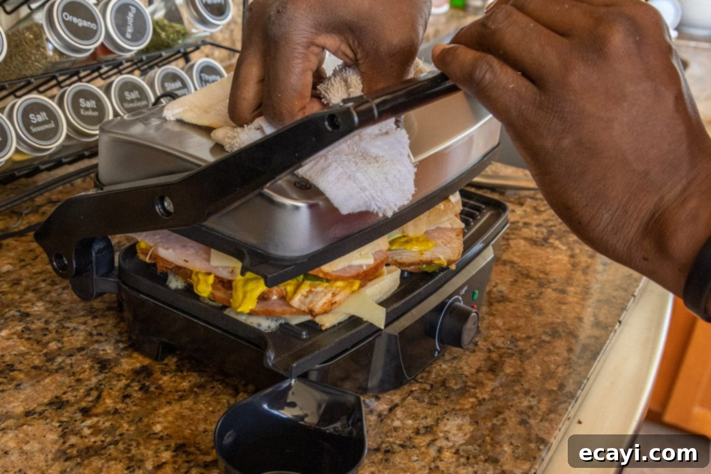 Cuban Sandwich: A Taste of Miami's Legacy 11 pressing cuban sandwich in a panini maker