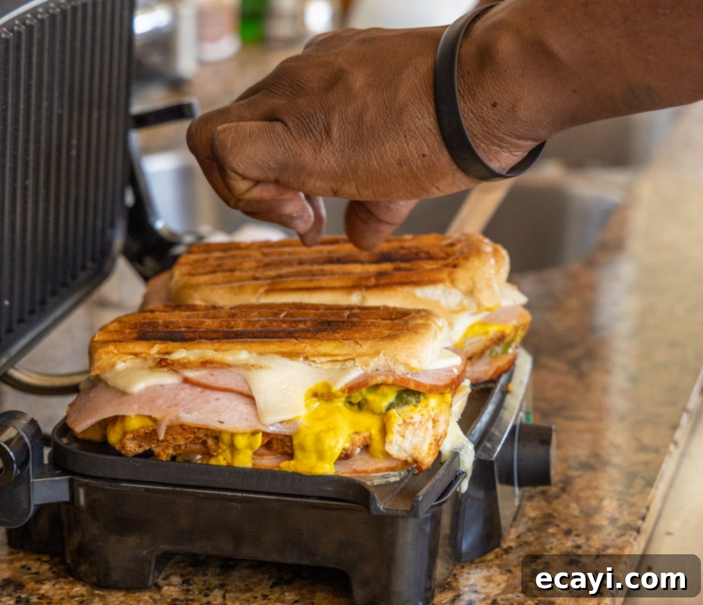 Cuban Sandwich: A Taste of Miami's Legacy 13 removing Cuban sandwich from panini maker