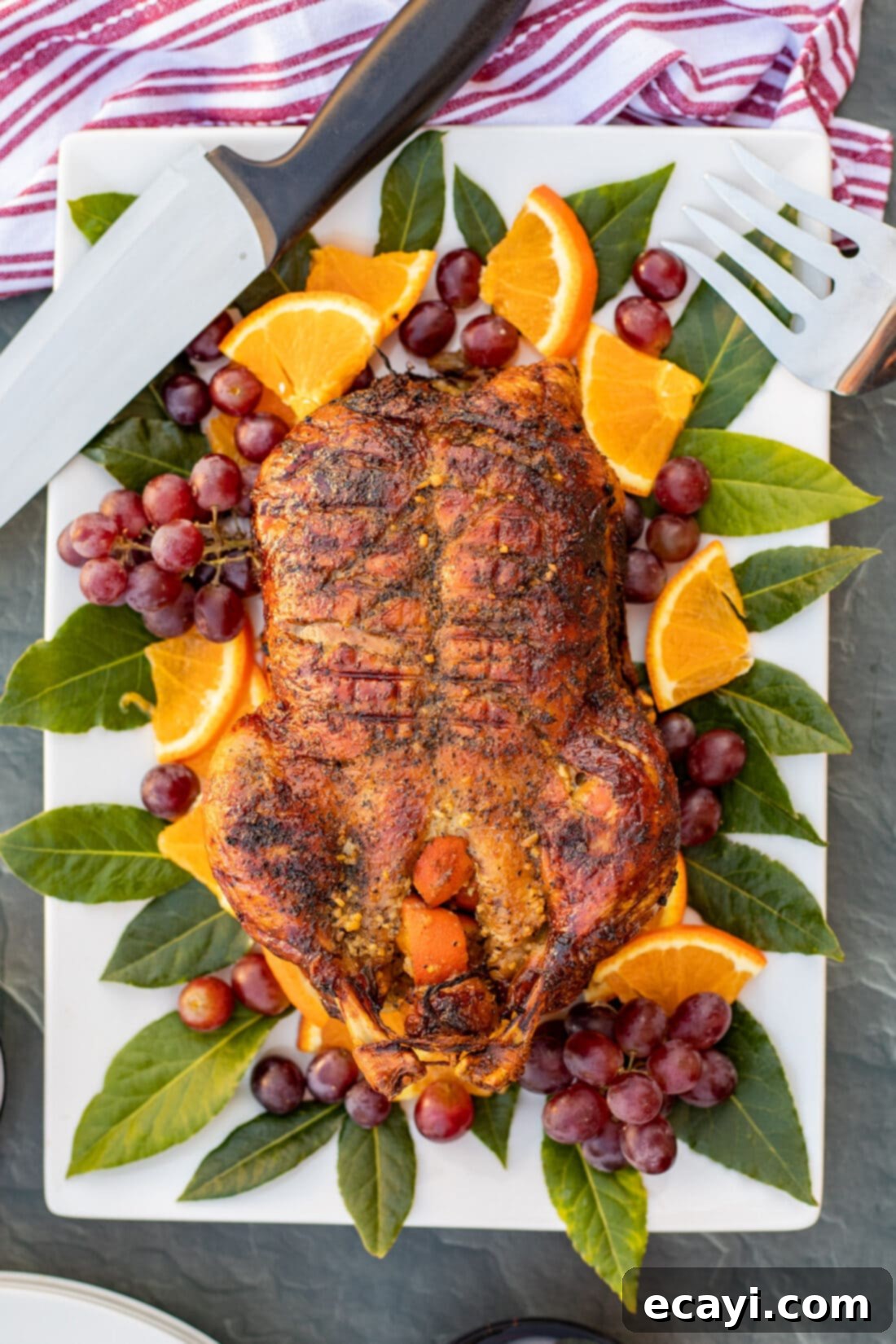 Crispy Roast Duck 2 Roast Duck on a platter with a knife