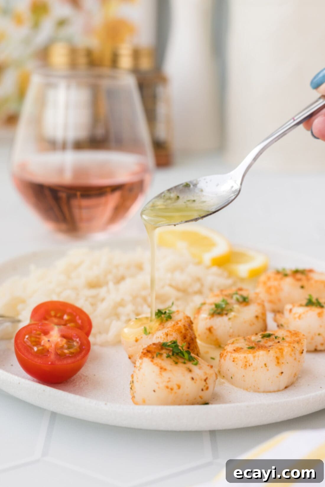 Perfect Air Fryer Scallops 2 drizzling butter on Air Fryer Scallops