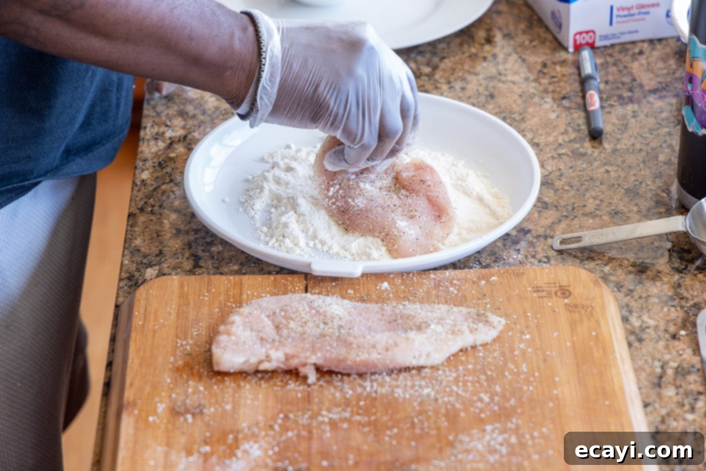 The Proposal Chicken 6 dredging chicken cutlets in flour