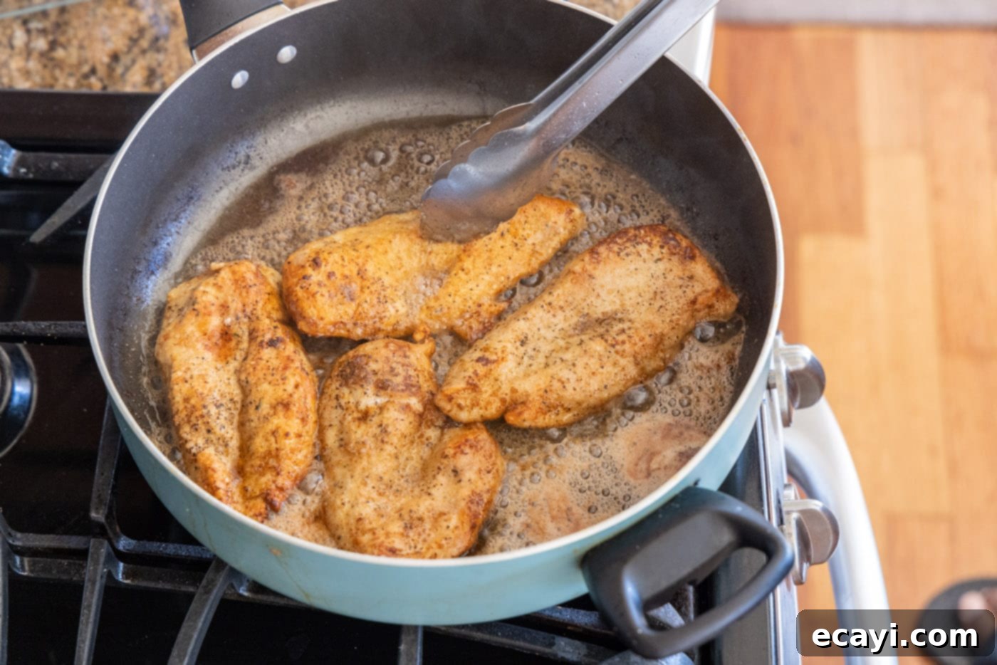 The Proposal Chicken 10 golden brown cooked chicken breasts in a skillet