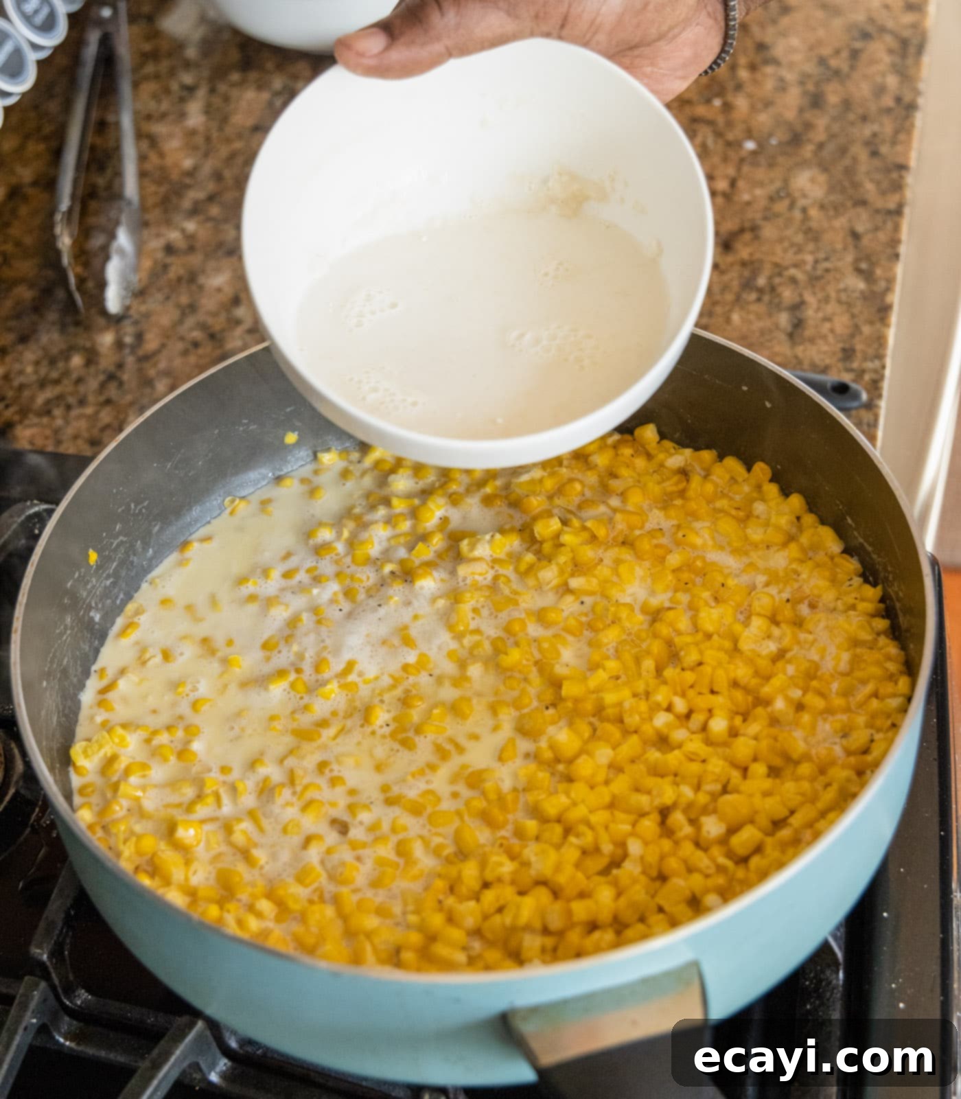 Golden Comfort Corn 8 adding milk and flour mixture to creamed corn in skillet