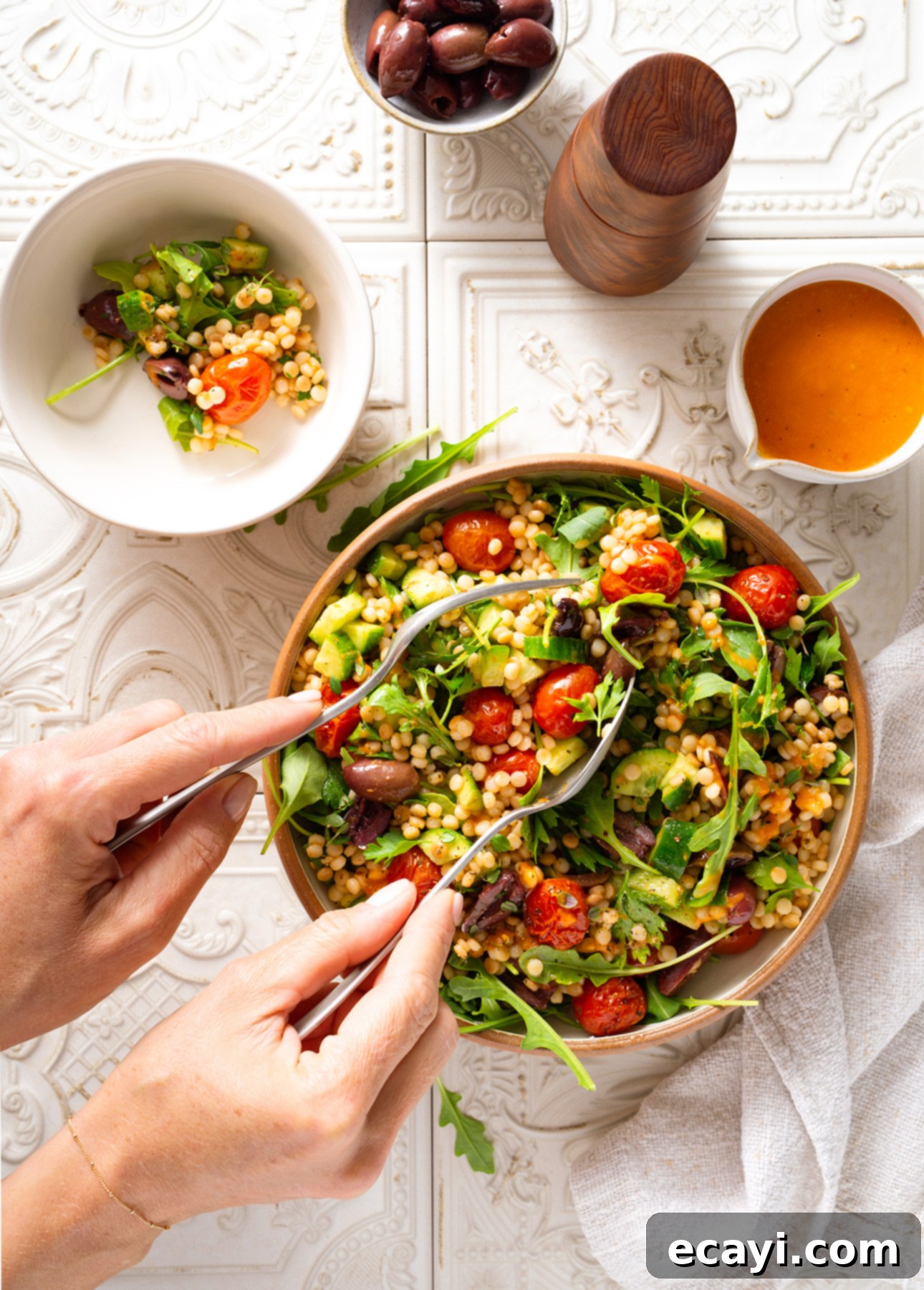 Pearl Couscous with Cherry Tomato Vinaigrette 3 Israeli Couscous Salad with Cherry Tomato Dressing // FoodNouveau.com