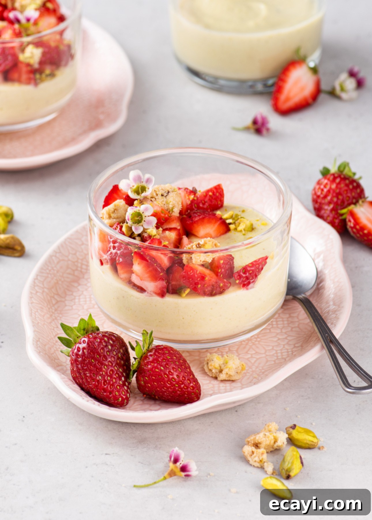 Strawberry Kissed Pistachio Delights 5 A serving of Pistachio Pudding with a generous topping of macerated strawberries and crumble // FoodNouveau.com