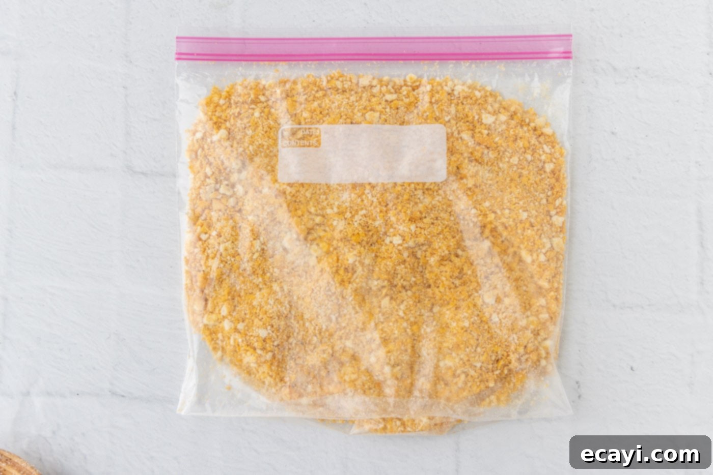 Heartwarming Potato Casserole 13 ritz crackers and cornflake crushed in a ziplock bag for crispy topping
