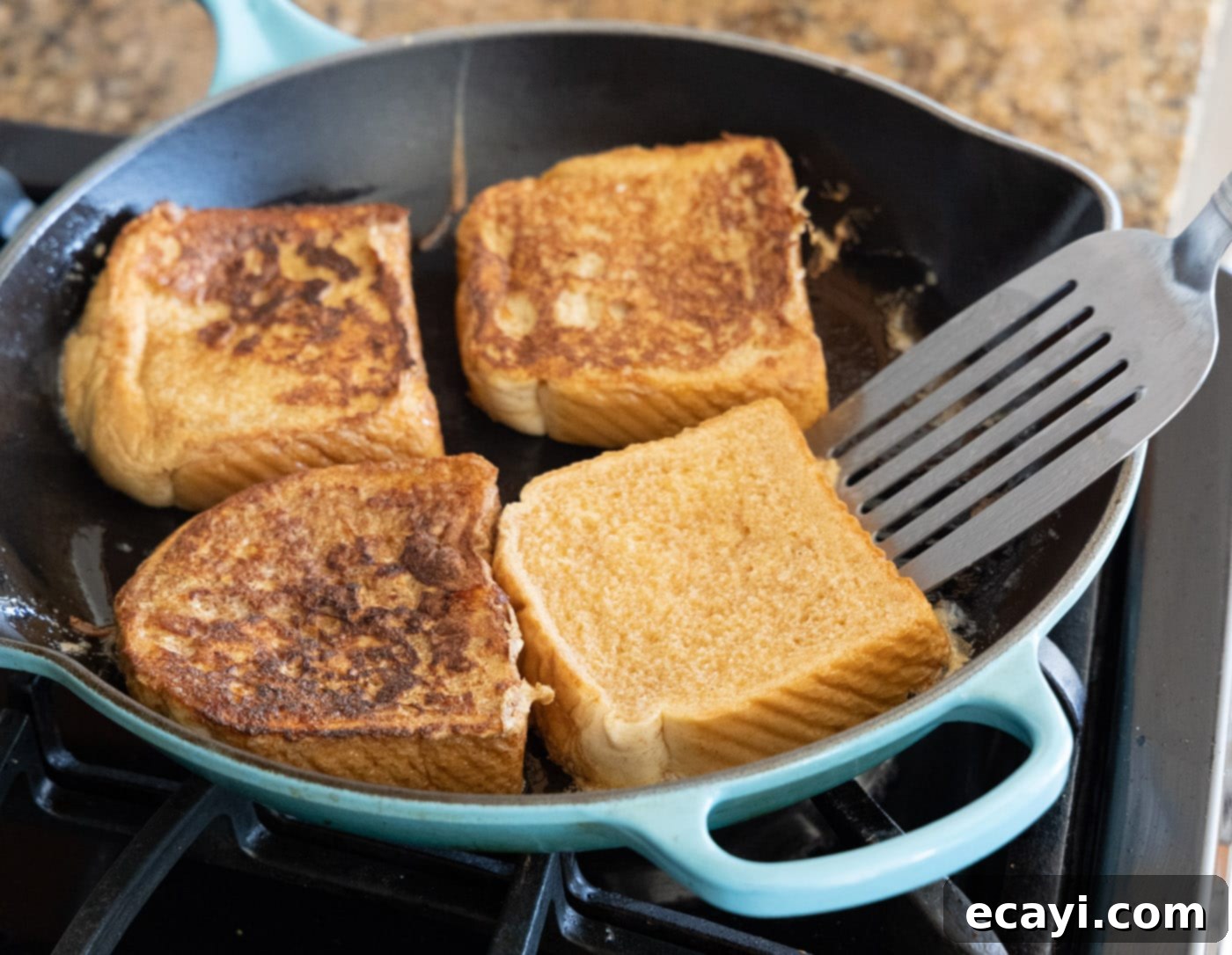 Golden Griddle Goodness 8 flipping french toast slices in a skillet