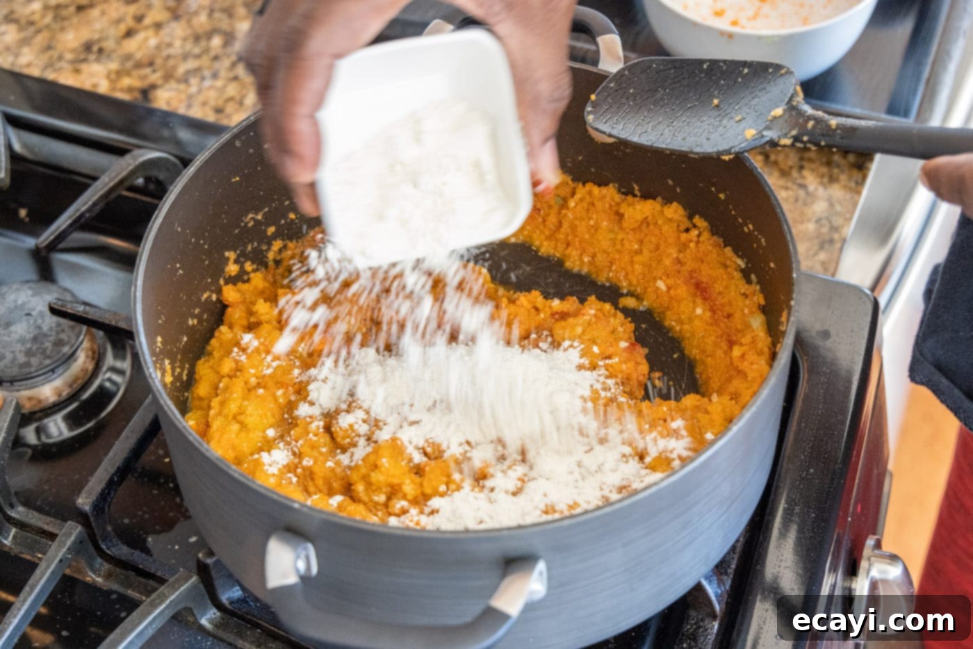 Rich Lobster Bisque 7 sprinkling all-purpose flour over the lobster bisque mixture in a Dutch oven to create a roux