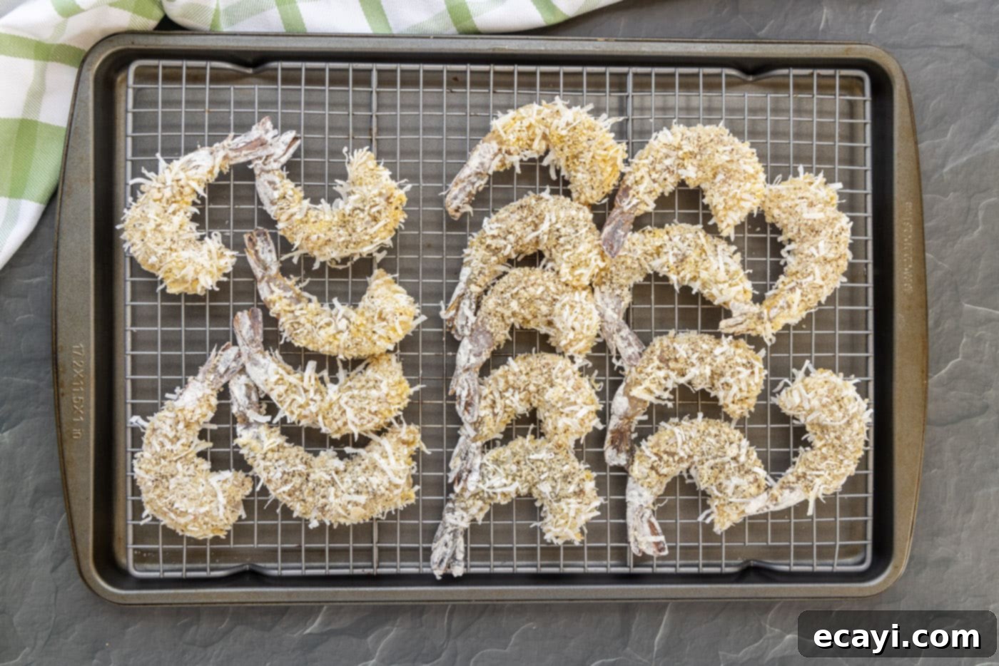 Crispy Air Fryer Coconut Shrimp 10 coconut shrimp on a wire baking sheet