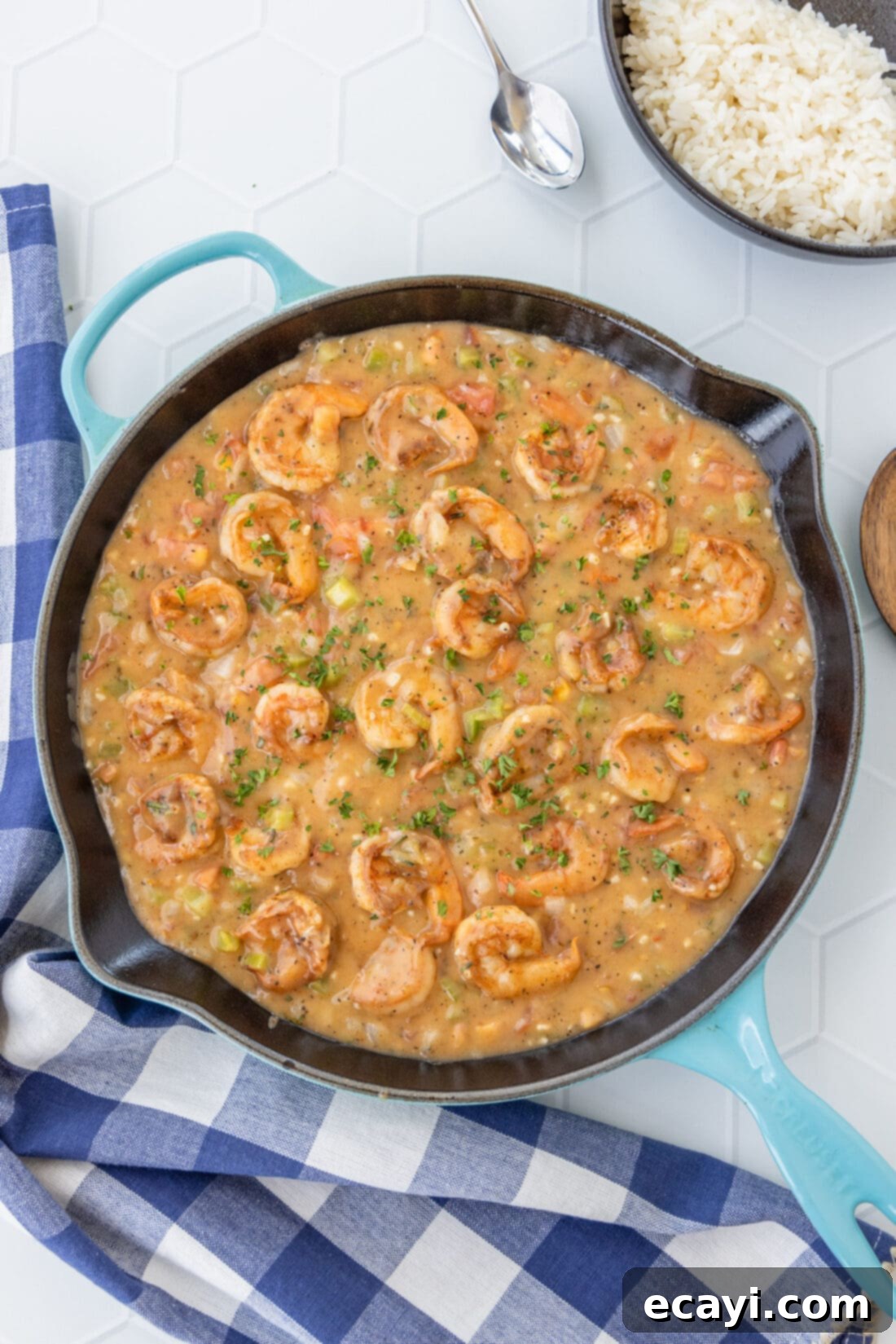 Authentic Cajun Shrimp Etouffee 2 Rich and savory shrimp etouffee bubbling in a cast iron skillet, ready to serve.