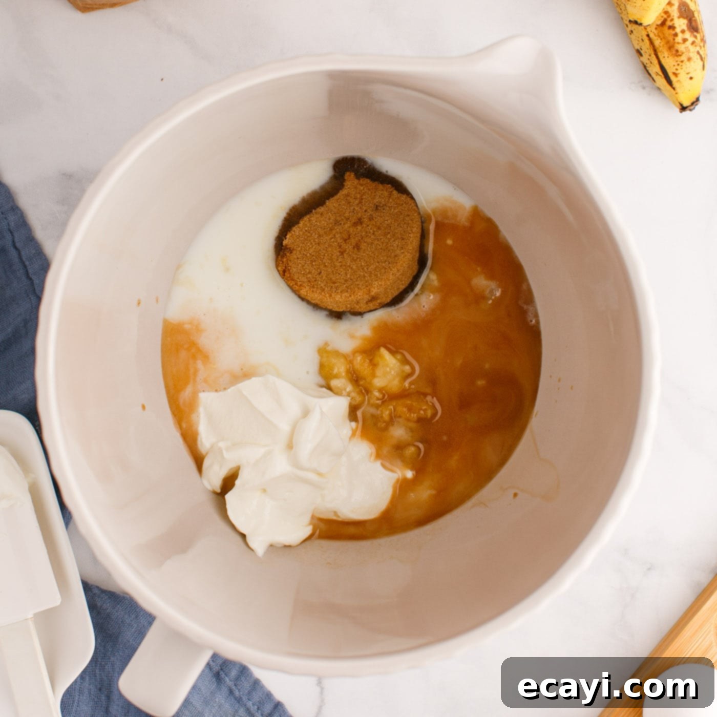 Banana Bliss with Chocolate Chips 6 ingredients for chocolate chip banana muffins in a bowl
