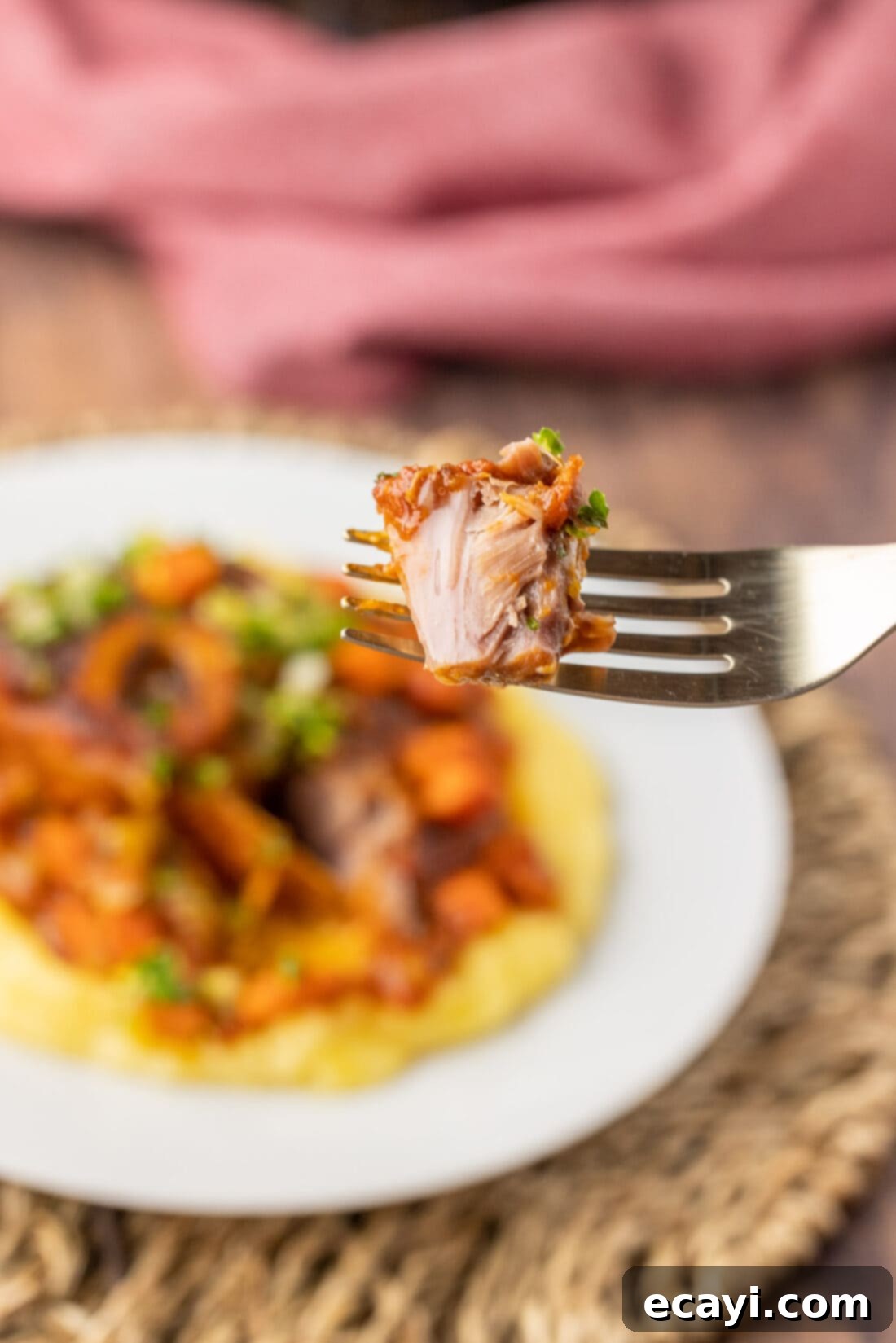 Exquisite Veal Osso Buco 18 Close-up of a fork holding a piece of tender Veal Osso Bucco