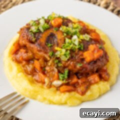 Exquisite Veal Osso Buco 19 Veal Osso Bucco on polenta, garnished with gremolata