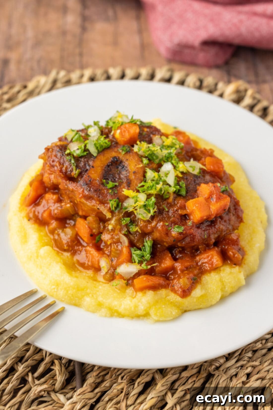 Exquisite Veal Osso Buco 3 Plate of Veal Osso Bucco with gremolata, ready to serve