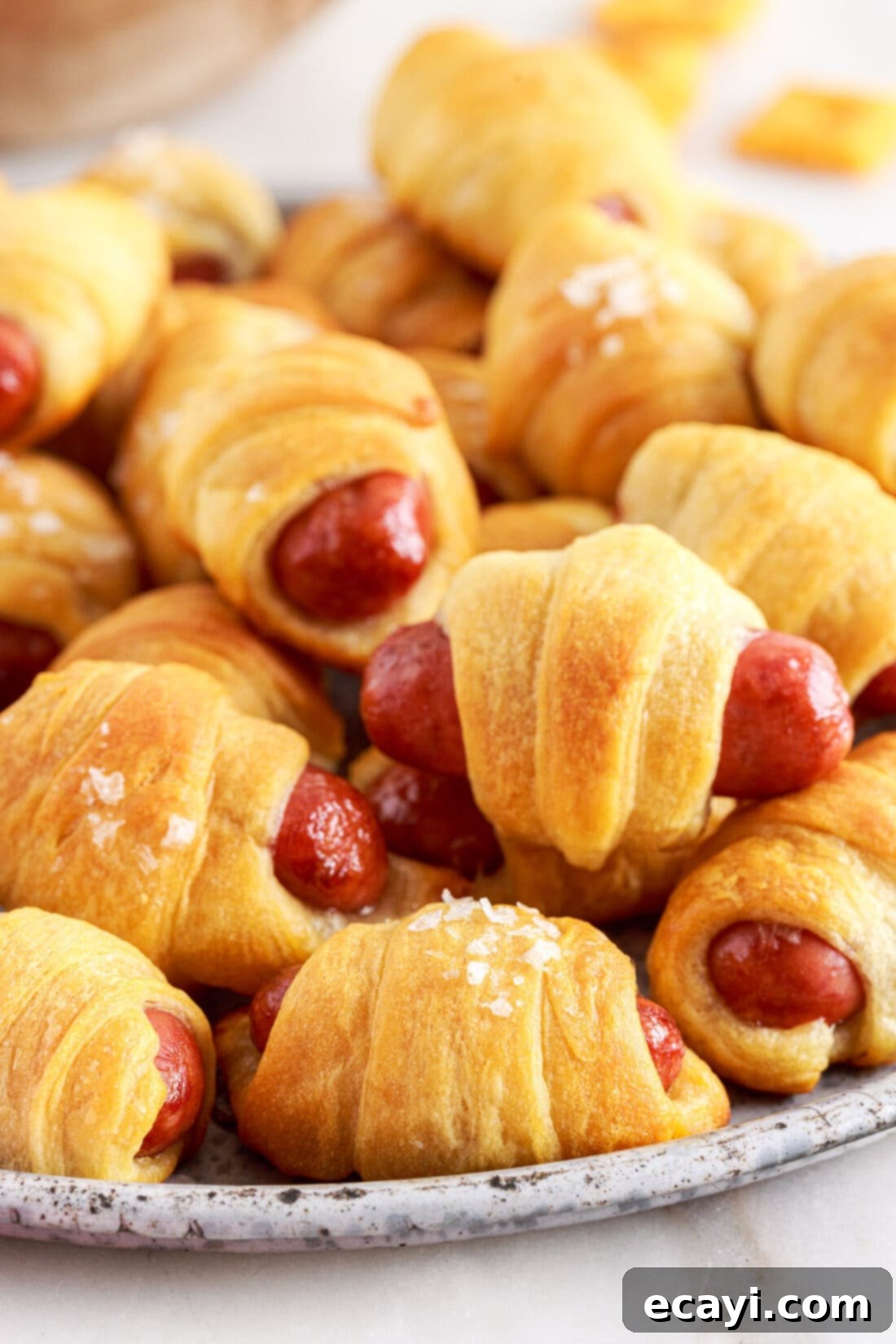 Swaddled Sausages 2 plate of Pigs in a Blanket, ready to be served at a party