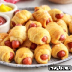 Swaddled Sausages 12 plate full of Pigs in a Blanket, ready to serve