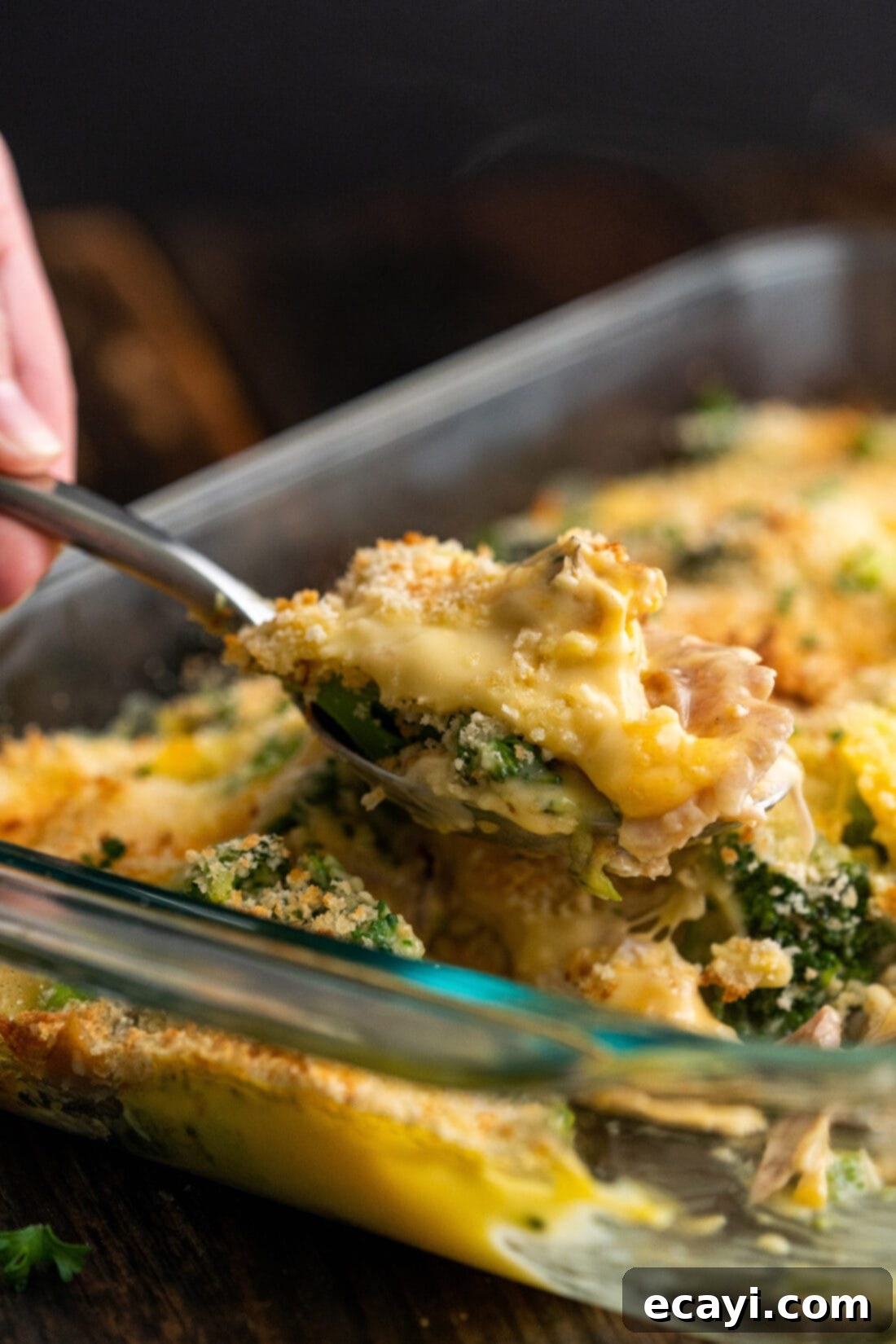 Creamy Chicken Broccoli Bake 3 spooning out Chicken Divan