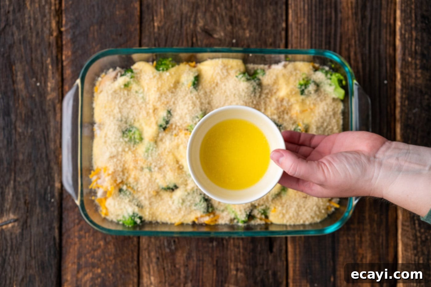 Creamy Chicken Broccoli Bake 10 drizzling butter over chicken divan casserole