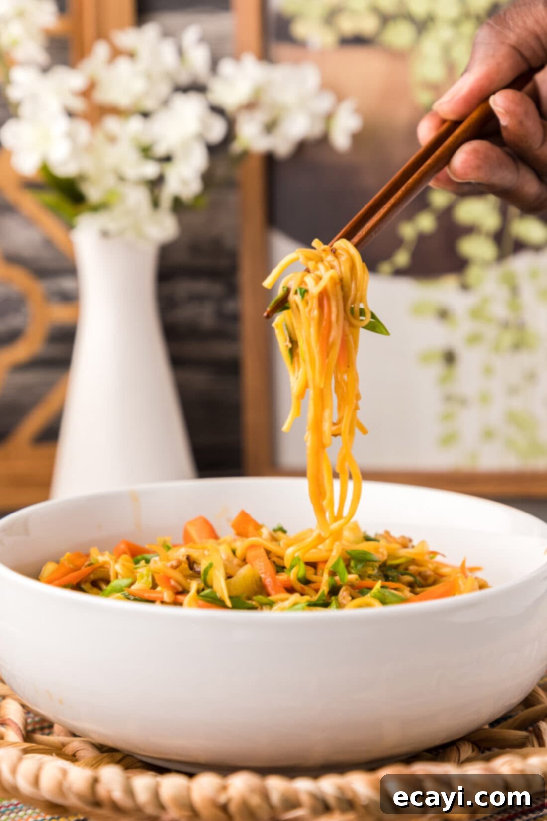 Chow Mein 13 lifting Chow Mein with chopsticks