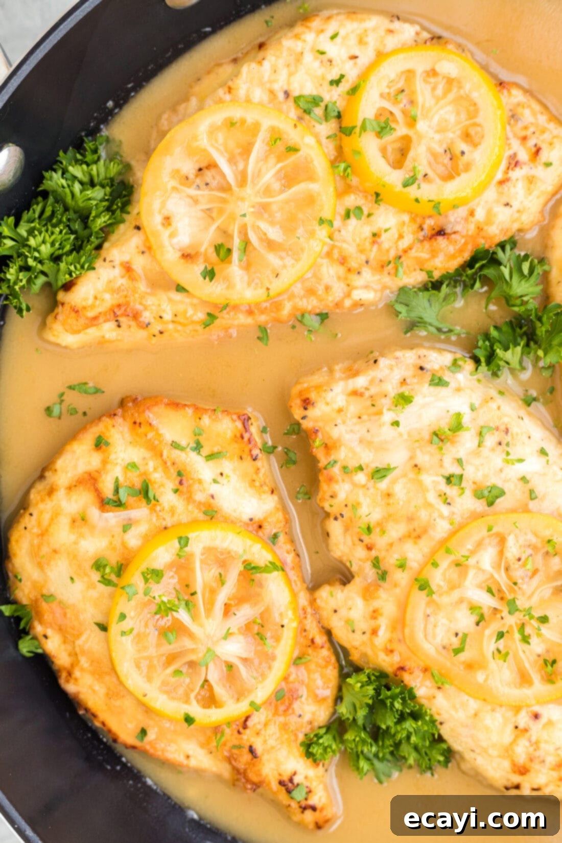 Golden Lemon Chicken 2 Chicken Francese in a skillet