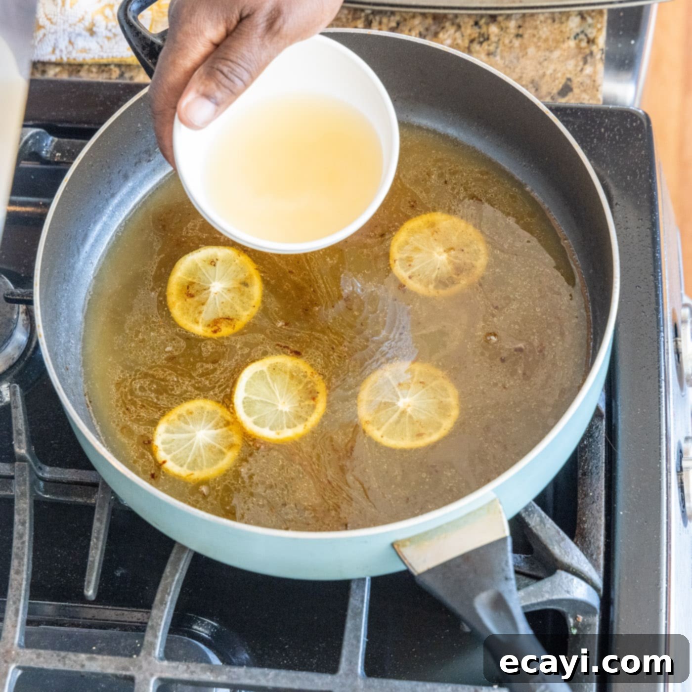 Golden Lemon Chicken 14 adding white wine to chicken francese
