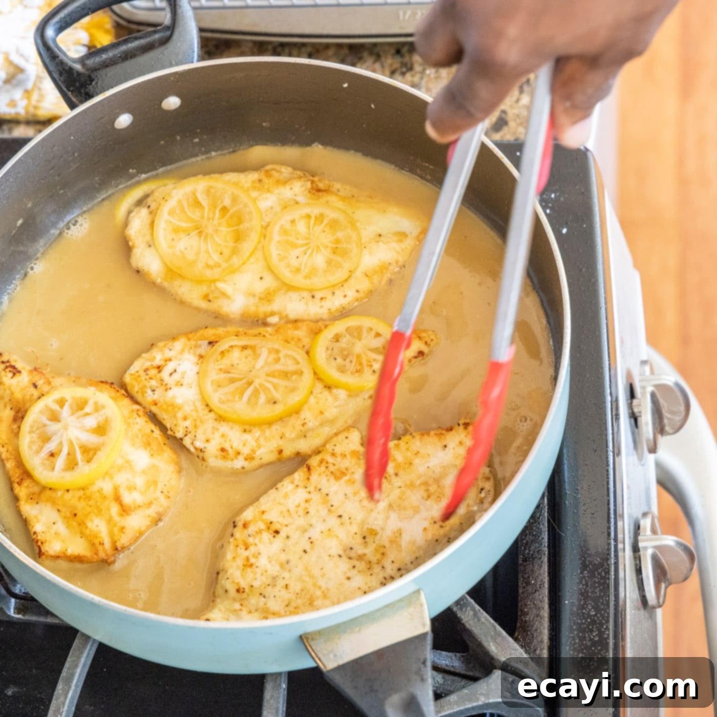 Golden Lemon Chicken 19 chicken francese in skillet