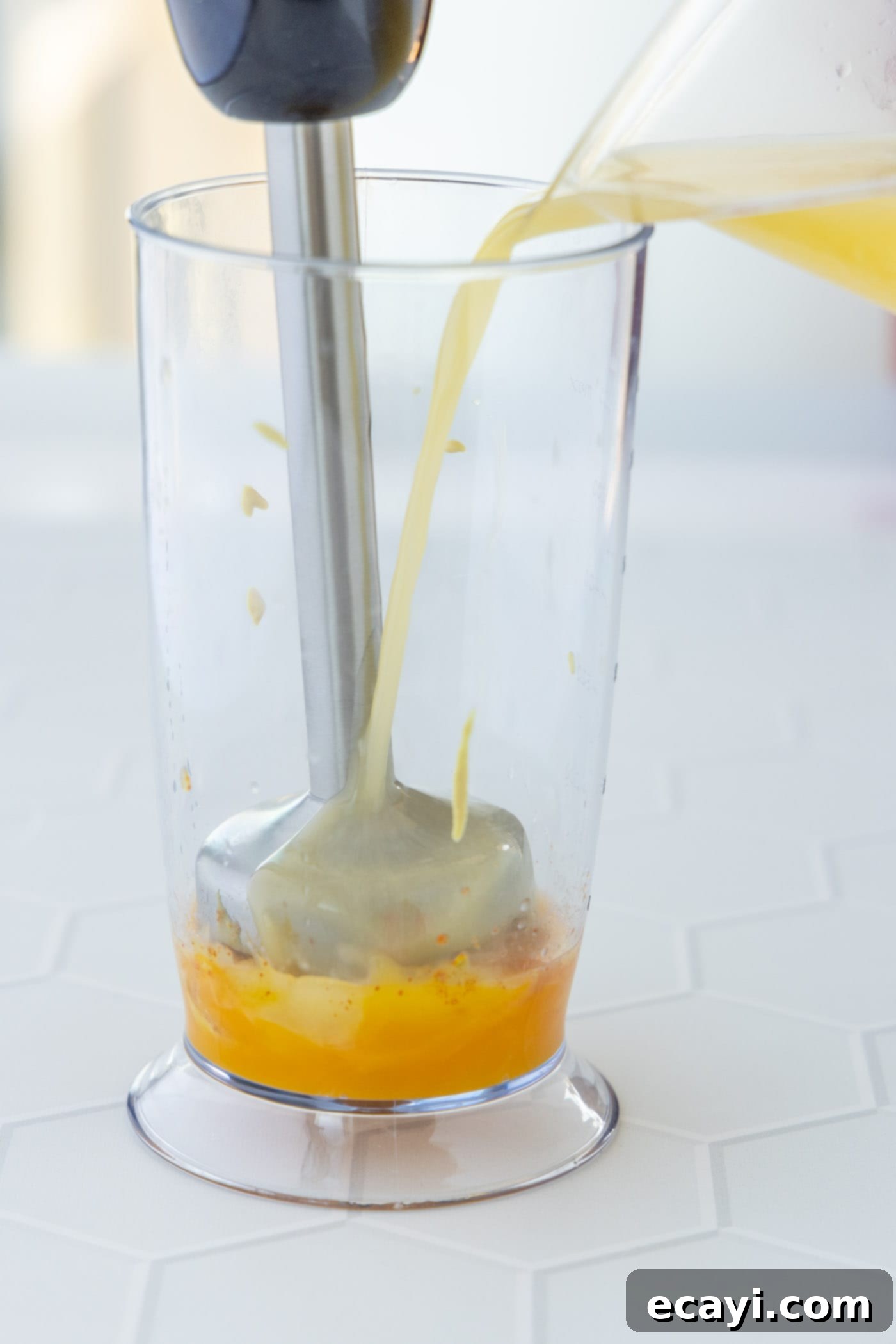 Classic Hollandaise Sauce 5 immersion blender blending hollandaise sauce ingredients