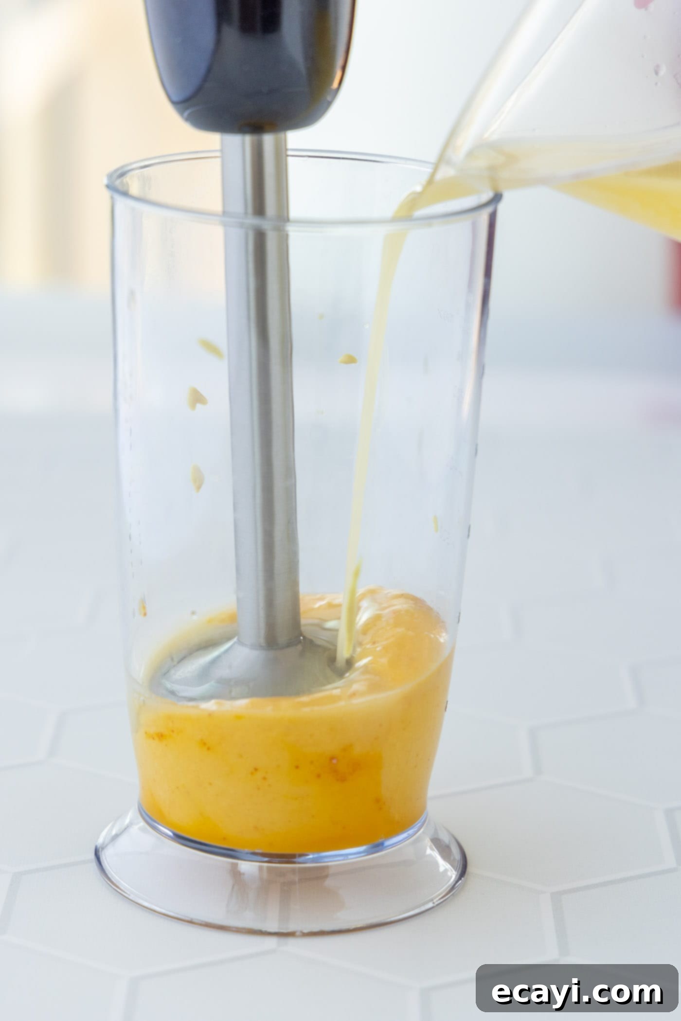 Classic Hollandaise Sauce 6 blitzing hollandaise sauce in immersion blender
