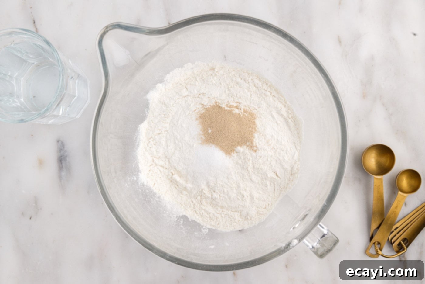 The Perfect Cast-Iron Loaf 5 flour, salt, and yeast in a stand mixer bowl